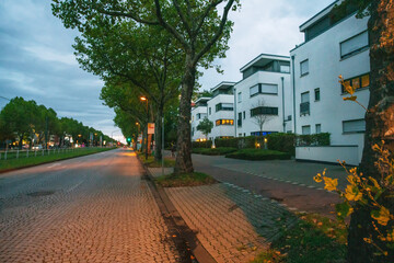 Nice paved road in Düsseldorf and 3 storey residential buildings