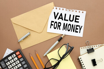 Value for Money. text on sticker on envelope brown background.
