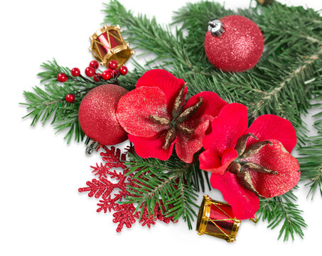 Christmas decorations with  tree branches and  baubles  isolated on white background