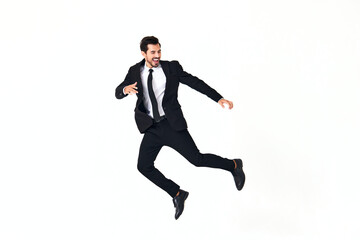 Man business smile with teeth in costume running and jumping up full-length on white isolated background copy space 