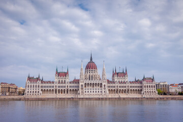 Fototapeta na wymiar Parliament and Danube River at dramatic sky, Budapest, Hungary