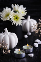 Fototapeta na wymiar Fall decoration with white pumpkins and chrysanthemum
