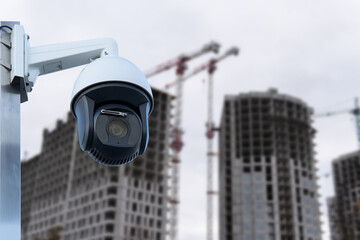 CCTV or surveillance camera watching for security 24 hours in construction site.