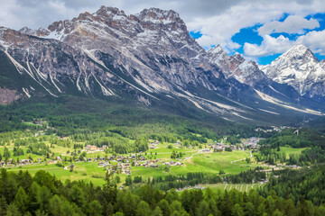 Naklejka na ściany i meble Cortina D Ampezzo cityscape and alpine meadows with Dolomites alps, Italy