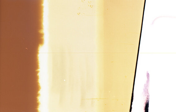 35mm film with light leaks, grain, scratches, and salt emulations scanned for use as textures in graphic and photo design
