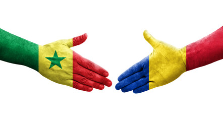 Handshake between Romania and Senegal flags painted on hands, isolated transparent image.