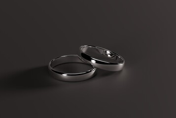 Silver wedding rings on a dark background. Wedding concept, propose. Jewelry making concept. 3D render, 3D illustration.