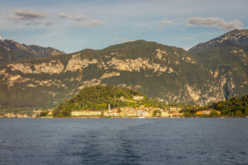 Mountains and Bellagio skyline, view from Lake Como at sunset, northern Italy