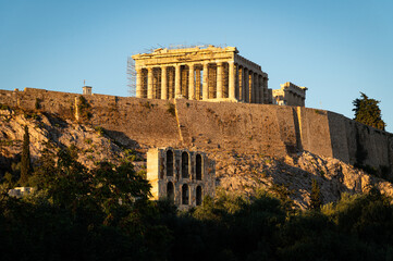 View of one side of the Parthenon as part of the Acropolis of Athens, Greece with scaffolding in the late afternoon.