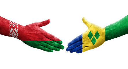 Handshake between Saint Vincent Grenadines and Belarus flags painted on hands, isolated transparent image.