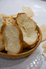 bread and butter bread in a basket on table crumbs messy dinner table fresh bread setting slices 