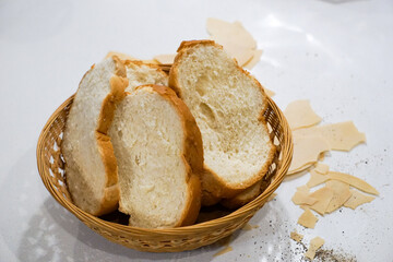 bread in a bowl bread in a basket on table crumbs messy dinner table fresh bread setting slices 