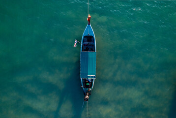 Obraz premium Aerial view of long tail boats in Thailand