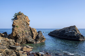 Fototapeta na wymiar Beautiful rock and bolders on the seashore along the coastline 