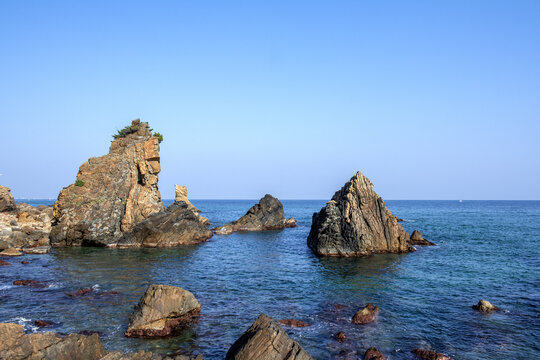 Beautiful rock and bolders on the seashore along the coastline 

