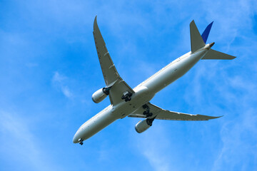 Airplanes, passengers flying in the sky, preparing to land at the airport