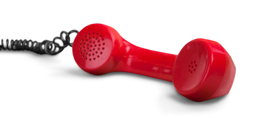 Answering an old fashioned red telephone handset