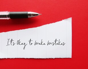 On red background, pencil writing on torn paper - It's Okay to Make Mistakes -  concept of positive...