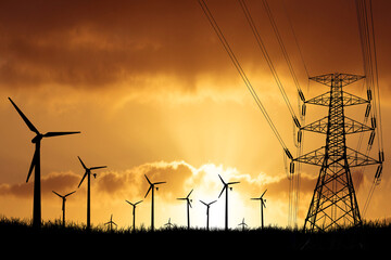 
Wind turbines produce electricity in a field. Wind energy concept, clean energy, environmental...