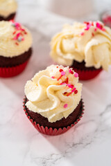 Red Velvet Cupcakes with White Chocolate Ganache Frosting