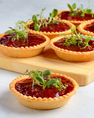tartlet with jam on light background