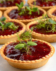 tartlet with jam on light background