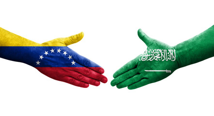 Handshake between Saudi Arabia and Venezuela flags painted on hands, isolated transparent image.