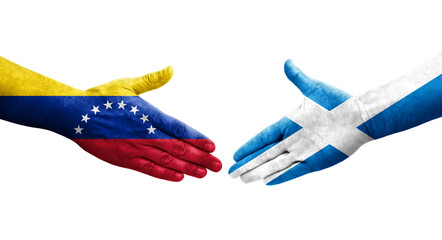 Handshake between Scotland and Venezuela flags painted on hands, isolated transparent image.