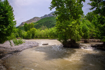 Behind the river is the foothills of the Pamir.