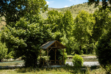 Handmade wooden alcoves in a riverside resort.