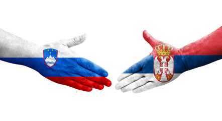 Handshake between Serbia and Slovenia flags painted on hands, isolated transparent image.