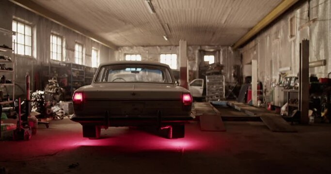 Garage with vintage car in daytime