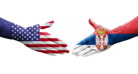 Handshake between Serbia and USA flags painted on hands, isolated transparent image.