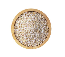 Pile of pearl barley in wood bowl isolated on transparent png