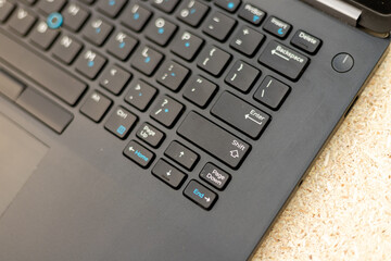 Close-up of the ENTER key on the laptop keyboard high angle view