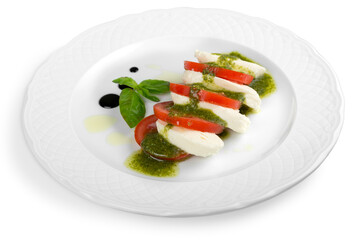 Close-up of tasty fresh salad in white plate isolated on white background