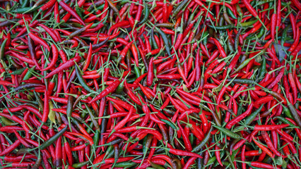 Hot chilli peppers pattern texture background. Close up background landscape of hot chili peppers.