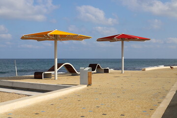 Canopy in the city park to protect from the scorching sun.