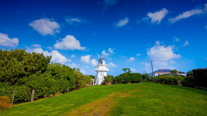 Slow Motion blur on the clouds taken with slow shutter for this images to see movement of the clouds with beautiful landscape at Katiki Point Lighthouse