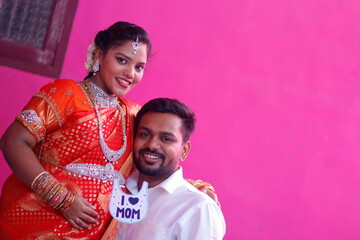 tamil couple showing baby proper dress