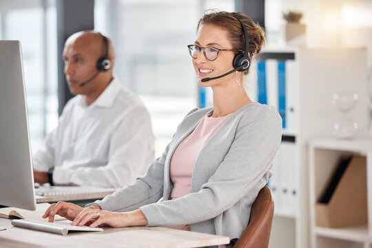 Call Center, Contact Us And Worker With A Computer For Support, Help And Consulting On The Internet. Telemarketing, Happy And Mature Customer Service Agent Typing An Email For Technical Support