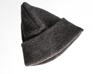 Gray warm unisex hat on a gray background