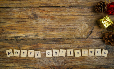 Merry Christmas.  wooden letters merry christmas word  on old wooden background