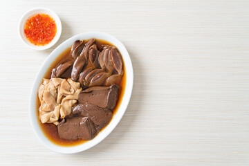 stewed duck offal in brown soup