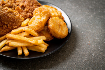 fried chicken with french fries and nuggets meal