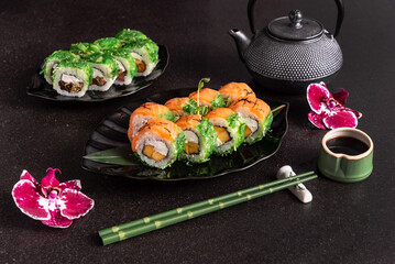 Fototapeta na wymiar japanese sushi on the dark background
