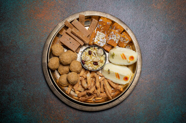 Festival of lights Diwali Celebration with sweets, desserts, and snacks