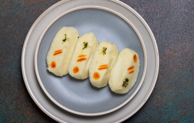 Celebration with traditional Bengali sweets cham cham or chom chom
