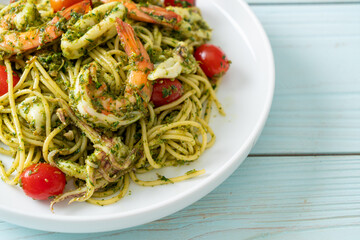 Spaghetti with seafood in homemade pesto sauce