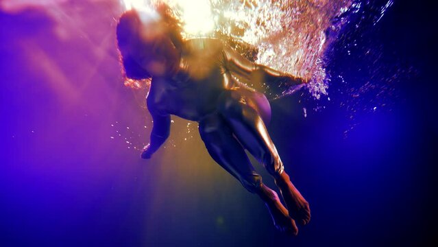 Fantastic lady underwater with metal clothes swims like a cyberpunk hero